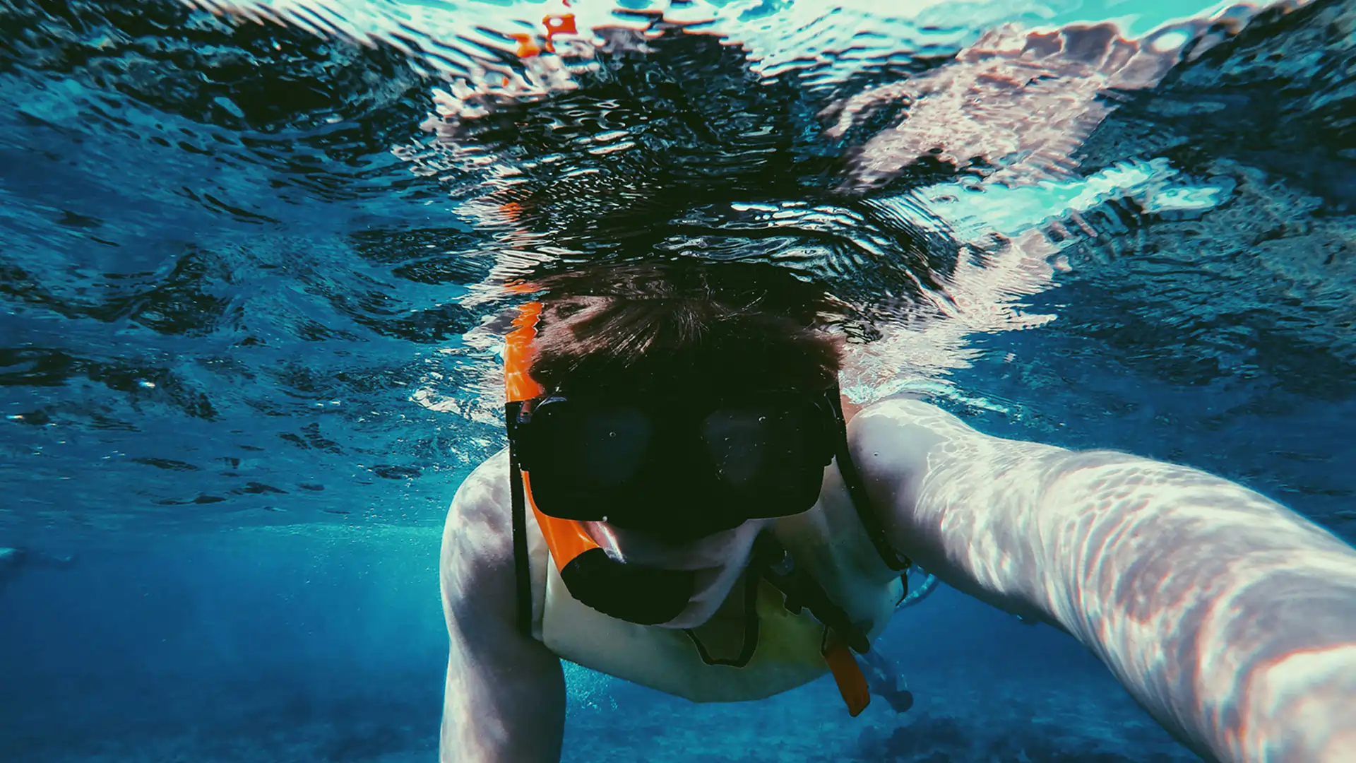 Scuba diver capturing underwater selfie at Netrani Island with Dolphin Dive Murudeshwar