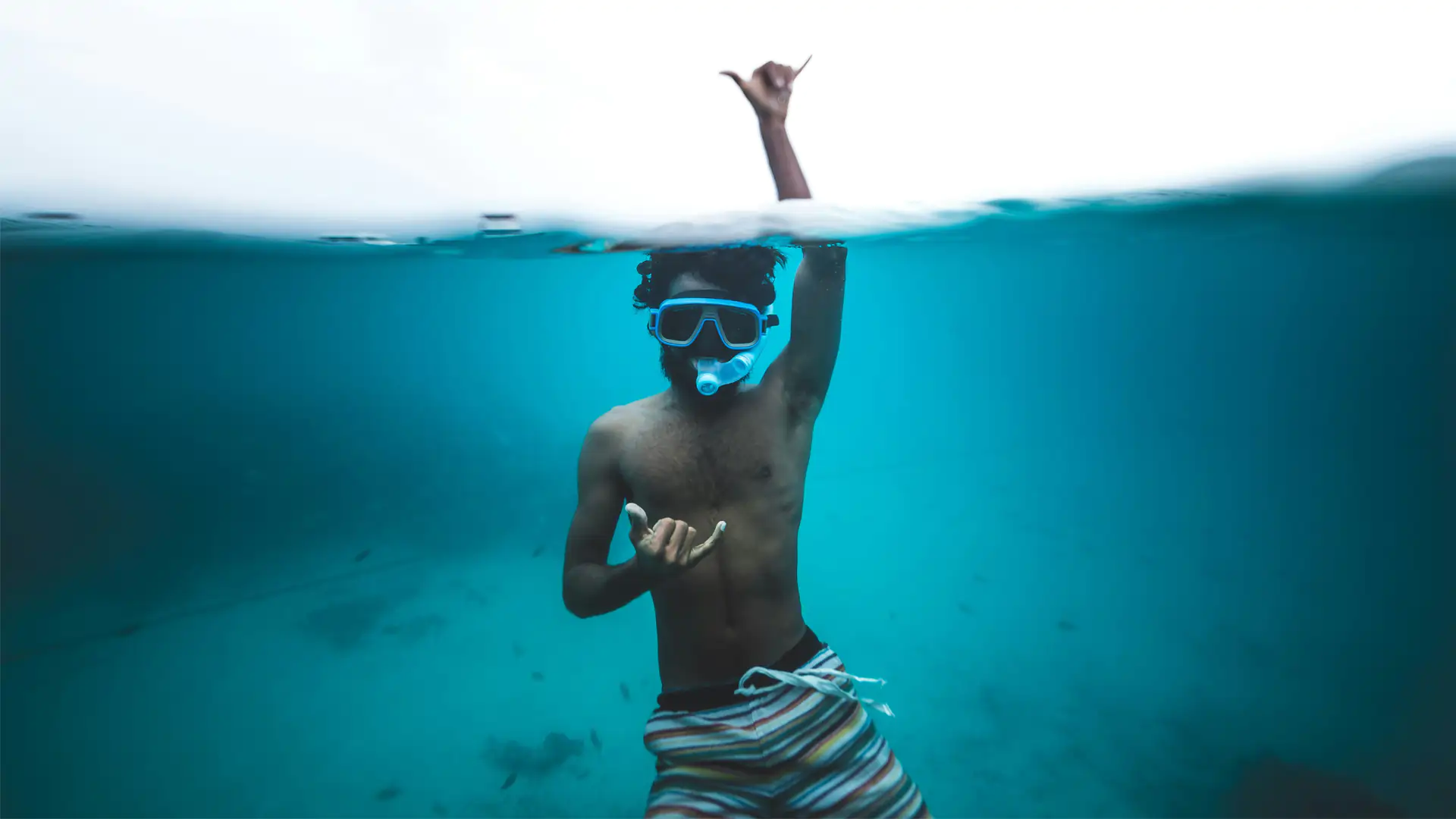 Snorkeler exploring clear blue waters at Netrani Island near Murudeshwar